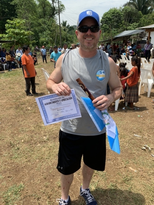 Kevin Bay with certificate